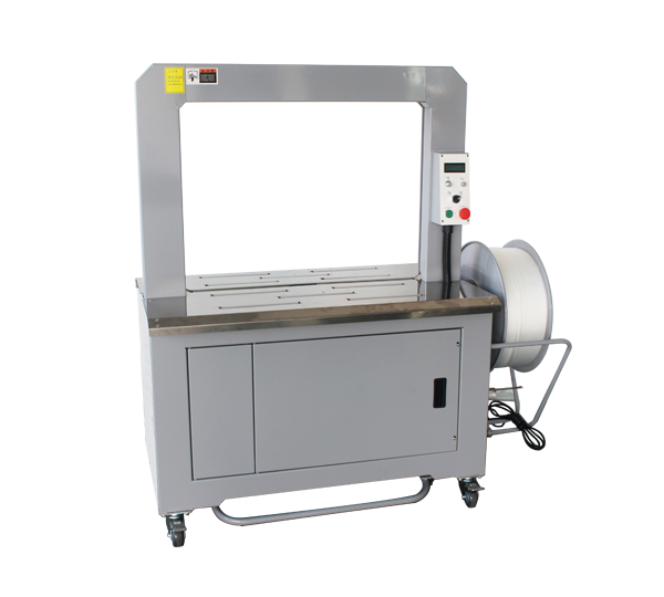 Precision table-top strapper