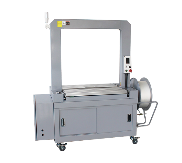 Precision inline table-top strapper